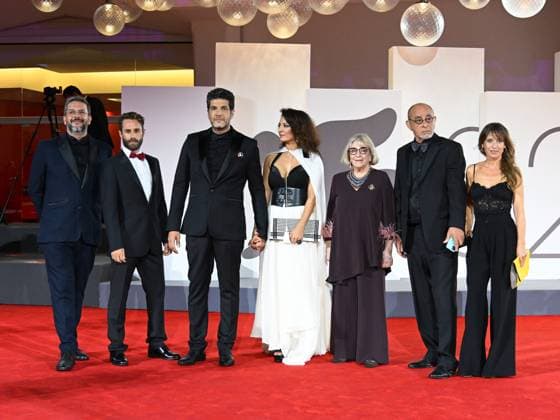 Venice, Italy: Venice, 82nd Venice International Film Festival 2025 - Evening 3 - The Red Carpet for the film Calle Malaga. Pictured: Stop the Genocide in Gaza: Nabil Ayouch, Maryam Touzani, Carmen Maura, Ahmed Boulane, and Marta Etura. Venice Italy  - ZUMAp169 20250829_zea_p169_1331 Copyright: xManuelexMangiarottix