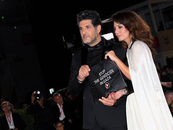 Venice, ITALY: Venice, 82nd Venice International Film Festival 2025 - Evening 3 - Red Carpet for the film Calle Malaga - Pictured: Nabil Ayouch and Maryam Touzani Venice ITALY  - ZUMAp169 20250829_zea_p169_1387 Copyright: xAlbertoxTerenghix