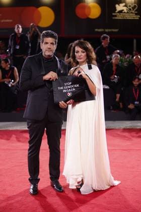 82nd Venice Film Festival - Eojjeol suga eopda (No Other Choice) VENICE, ITALY - AUGUST 29: Director Maryam Touzani and producer Nabil Ayouch display a pro-Palestine sign at the red carpet of the film Eojjeol suga eopda (No Other Choice) at the 82nd Venice Film Festival in Venice, Italy on August 29th, 2025. Marco Barada Anadolu Venice Italy. Editorial use only. Please get in touch for any other usage.  Copyright: x2025xAnadoluxMarcoxBaradax