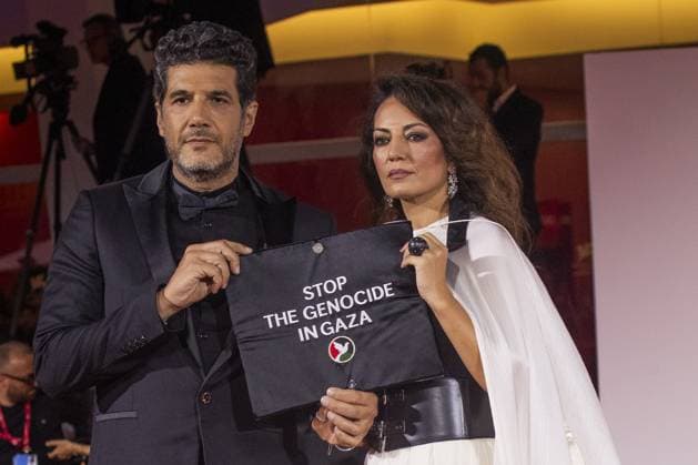 Eojjeol Suga Eopda (No Other Choice) Red Carpet - The 82nd Venice International Film Festival VENICE, ITALY - AUGUST 29: Producer Nabil Ayouch and director Maryam Touzani of the movie Calle Malaga during the Eojjeol Suga Eopda (No Other Choice) red carpet showing their support pro Palestine during the 82nd Venice International Film Festival on August 29, 2025 in Venice, Italy. Prima Barol Anadolu Venice Italy. Editorial use only. Please get in touch for any other usage.  Copyright: x2025xAnadoluxPrimaxBarolx