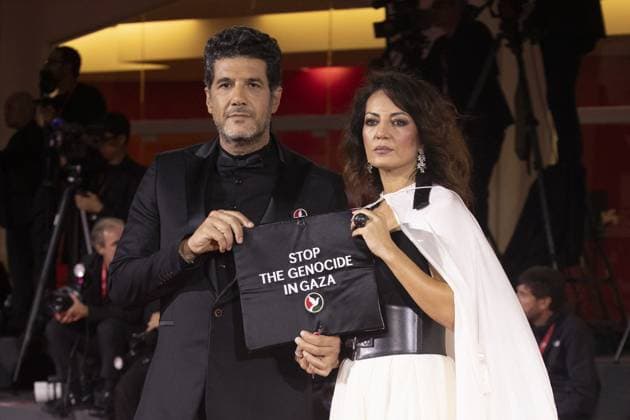 Eojjeol Suga Eopda (No Other Choice) Red Carpet - The 82nd Venice International Film Festival VENICE, ITALY - AUGUST 29: Producer Nabil Ayouch and director Maryam Touzani of the movie Calle Malaga during the Eojjeol Suga Eopda (No Other Choice) red carpet showing their support pro Palestine during the 82nd Venice International Film Festival on August 29, 2025 in Venice, Italy. Prima Barol Anadolu Venice Italy. Editorial use only. Please get in touch for any other usage.  Copyright: x2025xAnadoluxPrimaxBarolx