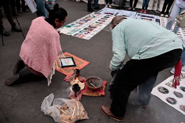 August 30, 2025, Mexico, Cdmx, Mexico: To commemorate the International Day of the Victims of Enforced Disappearances, a group of search groups gathered at the Glorieta de las y los Desaparecidos (Glorieta of the Disappeared) in Mexico City. Here, they held an ecumenical event in memory of their missing relatives throughout the country. During this demonstration, they cleaned the wall covering the roundabout to post more and new search cards. The missing persons crisis in Mexico is growing daily, with more than 130,000 missing persons reported so far this year. Mexico Mexico - ZUMAp204 20250830_zip_p204_004 Copyright: xJosuexPerezx