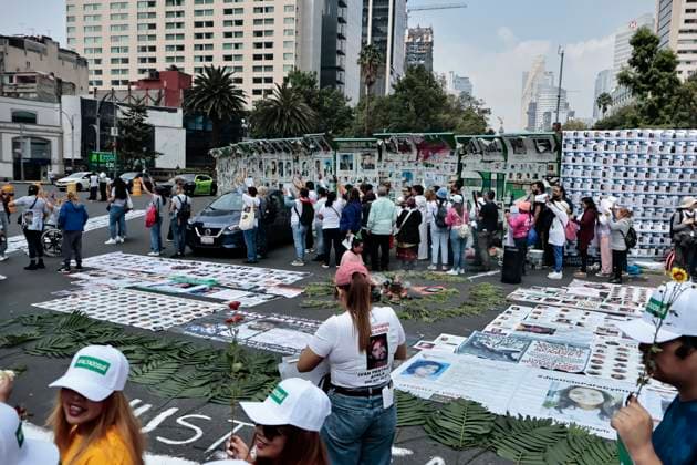 August 30, 2025, Mexico, Cdmx, Mexico: To commemorate the International Day of the Victims of Enforced Disappearances, a group of search groups gathered at the Glorieta de las y los Desaparecidos (Glorieta of the Disappeared) in Mexico City. Here, they held an ecumenical event in memory of their missing relatives throughout the country. During this demonstration, they cleaned the wall covering the roundabout to post more and new search cards. The missing persons crisis in Mexico is growing daily, with more than 130,000 missing persons reported so far this year. Mexico Mexico - ZUMAp204 20250830_zip_p204_027 Copyright: xJosuexPerezx