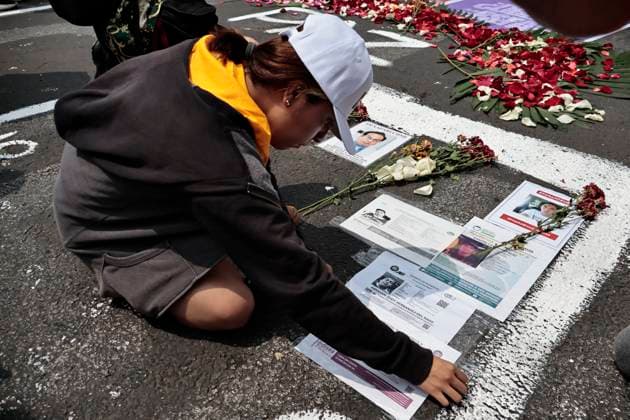 August 30, 2025, Mexico, Cdmx, Mexico: To commemorate the International Day of the Victims of Enforced Disappearances, a group of search groups gathered at the Glorieta de las y los Desaparecidos (Glorieta of the Disappeared) in Mexico City. Here, they held an ecumenical event in memory of their missing relatives throughout the country. During this demonstration, they cleaned the wall covering the roundabout to post more and new search cards. The missing persons crisis in Mexico is growing daily, with more than 130,000 missing persons reported so far this year. Mexico Mexico - ZUMAp204 20250830_zip_p204_035 Copyright: xJosuexPerezx