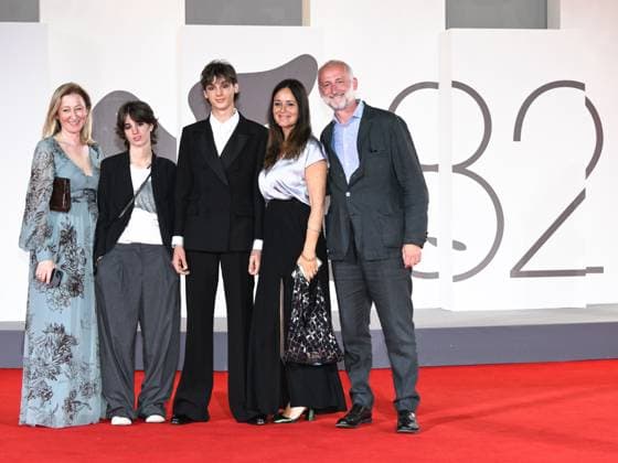 Venice, Italy: Venice, 82nd Venice International Film Festival 2025 - Evening 4 - Red Carpet for the film The Valley of Smiles. Pictured is Giulio Feltri with his family. Venice Italy  - ZUMAp169 20250830_zea_p169_1966 Copyright: xSimonexComix