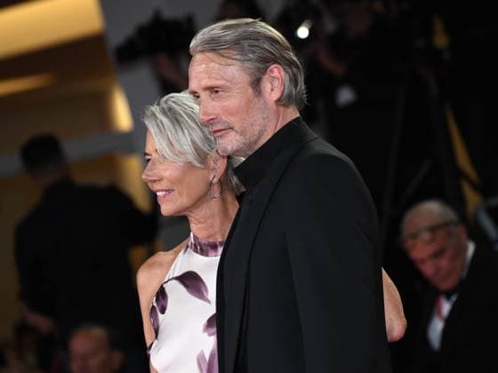 Venice, Italy: Venice, 82nd Venice International Film Festival 2025 - Evening 4 - Red Carpet for the film The Last Viking . Pictured: Mads Mikkelsen with his wife Hanne Jacobsen. Venice Italy  - ZUMAp169 20250830_zea_p169_1848 Copyright: xSimonexComix