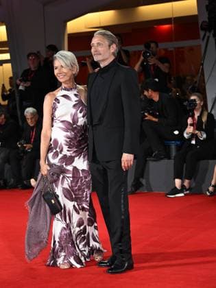 Venice, Italy: Venice, 82nd Venice International Film Festival 2025 - Evening 4 - Red Carpet for the film The Last Viking . Pictured: Mads Mikkelsen with his wife Hanne Jacobsen. Venice Italy  - ZUMAp169 20250830_zea_p169_1850 Copyright: xSimonexComix