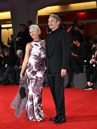 Venice, Italy: Venice, 82nd Venice International Film Festival 2025 - Evening 4 - Red Carpet for the film The Last Viking . Pictured: Mads Mikkelsen with his wife Hanne Jacobsen. Venice Italy  - ZUMAp169 20250830_zea_p169_1852 Copyright: xSimonexComix