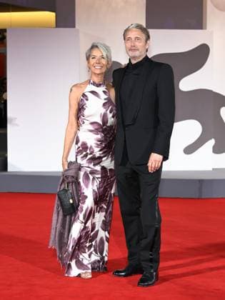 Venice, Italy: Venice, 82nd Venice International Film Festival 2025 - Evening 4 - Red Carpet for the film The Last Viking . Pictured: Mads Mikkelsen with his wife Hanne Jacobsen. Venice Italy  - ZUMAp169 20250830_zea_p169_1854 Copyright: xSimonexComix