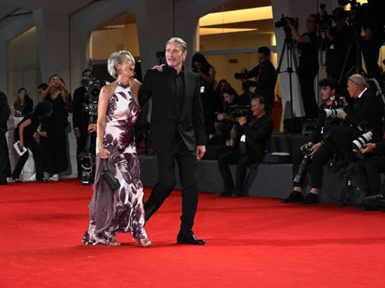Venice, Italy: Venice, 82nd Venice International Film Festival 2025 - Evening 4 - Red Carpet for the film The Last Viking . Pictured: Mads Mikkelsen with his wife Hanne Jacobsen. Venice Italy  - ZUMAp169 20250830_zea_p169_1846 Copyright: xSimonexComix