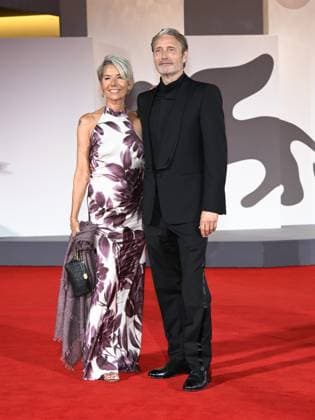 Venice, Italy: Venice, 82nd Venice International Film Festival 2025 - Evening 4 - Red Carpet for the film The Last Viking . Pictured: Mads Mikkelsen with his wife Hanne Jacobsen. Venice Italy  - ZUMAp169 20250830_zea_p169_1857 Copyright: xSimonexComix