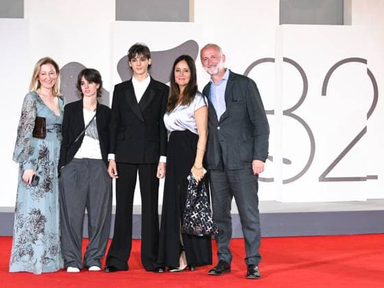 Venice, Italy: Venice, 82nd Venice International Film Festival 2025 - Evening 4 - Red Carpet for the film The Valley of Smiles. Pictured is Giulio Feltri with his family. Venice Italy  - ZUMAp169 20250830_zea_p169_1932 Copyright: xSimonexComix
