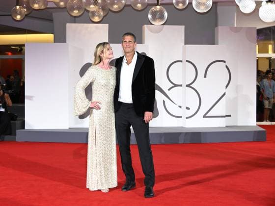 Venice, Italy: Venice, 82nd Venice International Film Festival 2025 - Evening 4 - Red Carpet for the film The Last Viking . Pictured: Anders Thomas Jensen with his wife Venice Italy  - ZUMAp169 20250830_zea_p169_1876 Copyright: xSimonexComix