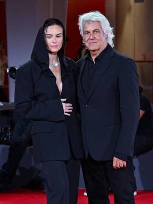 Venice, ITALY: Venice, 82nd Venice International Film Festival 2025 - Evening 4 - Red Carpet for the film The Valley of Smiles - Pictured: Kasia Smutniak, Domenico Procacci Venice ITALY  - ZUMAp169 20250830_zea_p169_1952 Copyright: xManuelexMangiarottix
