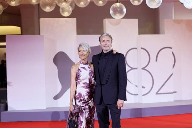 VENICE, ITALY - AUGUST 30: Hanne Jacobsen and Mads Mikkelsen attend the Den Sidste Viking (The Last Viking) red carpet during the 82nd Venice International Film Festival on August 30, 2025 in Venice, Italy. markxcape