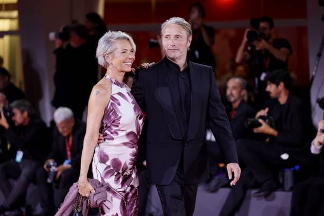 VENICE, ITALY - AUGUST 30: Hanne Jacobsen and Mads Mikkelsen attend the Den Sidste Viking (The Last Viking) red carpet during the 82nd Venice International Film Festival on August 30, 2025 in Venice, Italy. markxcape