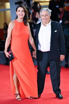 Venice Father Mother Sister Brother Premiere AM Christian Clavier and Isabelle de Araujo attending the Father Mother Sister Brother Premiere as part of the 82nd Venice International Film Festival at the Lido in Venice, Italy on August 31, 2025. Photo by Aurore Marechal ABACAPRESS.COM Venice Italy  Copyright: xMarechalxAurore ABACAx
