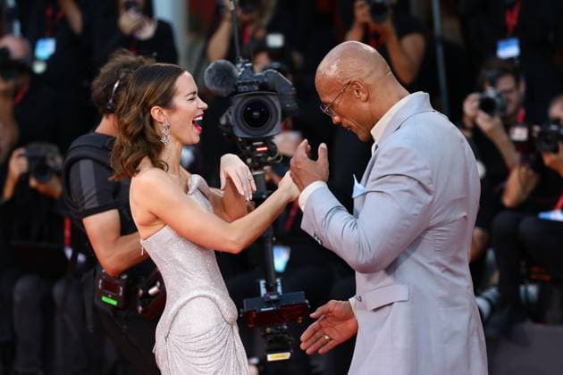 September 1, 2025, Venice, Veneto, Italy: EMILY BLUNT and DWAYNE JOHNSON have fun on the red carpet for The Smashing Machine Premiere screening at the 82nd Venice Film Festival at the Venice Lido, Italy. Venice Italy - ZUMAc179 20250901_zep_c179_186 Copyright: xMickaelxChavetx