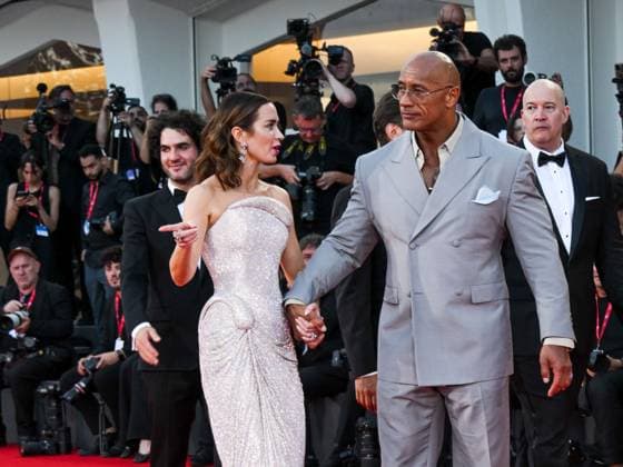 Venice, ITALY: Venice, 82nd Venice International Film Festival 2025 - evening 6, red carpet of the film The Smashing Machine In the photo: Emily Blunt Dwayne Johnson The Rock Venice ITALY  - ZUMAp169 20250901_zea_p169_1301 Copyright: xSimonexComix