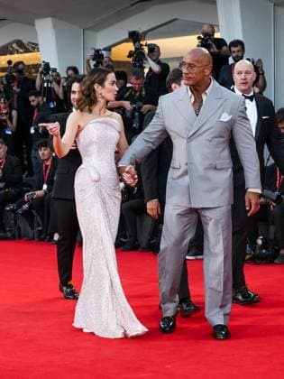 Venice, ITALY: Venice, 82nd Venice International Film Festival 2025 - evening 6, red carpet of the film The Smashing Machine In the photo: Emily Blunt Dwayne Johnson The Rock Venice ITALY  - ZUMAp169 20250901_zea_p169_1322 Copyright: xSimonexComix