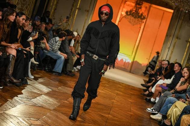 PFW - Austin Post Runway in Paris FA A model walks the runway for the Austin Post collection by American singer Post Malone as part of Paris Fashion Week in Paris, on September 1, 2025. Photo by Firas Abdullah ABACAPRESS.COM Paris Ile-de-France France  Copyright: xAbdullahxFiras ABACAx