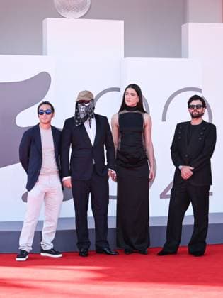 Venice, 82nd Venice International Film Festival 2025 - evening 7 - red carpet of the film L Etranger (The Stranger) In the photo: Eric Kohn, Stillz, Arca and Esteban Zuluaga  Copyright: xSimonexComix xipa-agency.netx xPoolxPhotoxEventsx06x IPA_Agency_IPA63959508