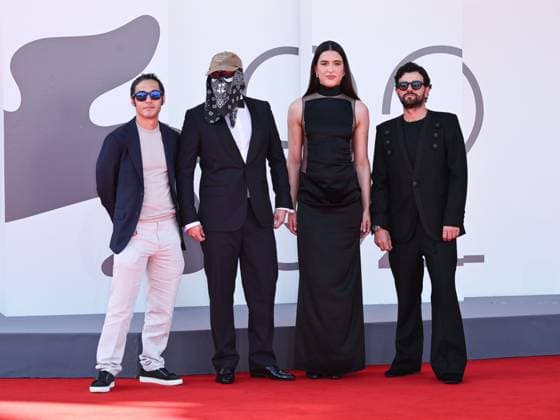 Venice, 82nd Venice International Film Festival 2025 - evening 7 - red carpet of the film L Etranger (The Stranger) In the photo: Eric Kohn, Stillz, Arca and Esteban Zuluaga  Copyright: xSimonexComix xipa-agency.netx xPoolxPhotoxEventsx06x IPA_Agency_IPA63959533