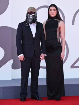 Venice, ITALY: Venice, 82nd Venice International Film Festival 2025 - evening 7 - red carpet of the film L Etranger (The Stranger) In the photo: Stillz and Arca Venice ITALY  - ZUMAp169 20250902_zea_p169_1116 Copyright: xSimonexComix
