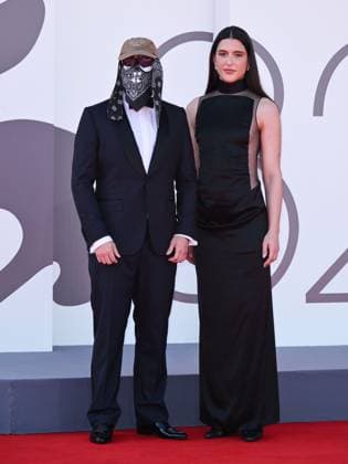 Venice, ITALY: Venice, 82nd Venice International Film Festival 2025 - evening 7 - red carpet of the film L Etranger (The Stranger) In the photo: Stillz and Arca Venice ITALY  - ZUMAp169 20250902_zea_p169_1119 Copyright: xSimonexComix