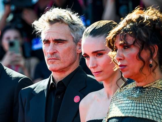 Venice, ITALY: Venice, 82nd Venice International Film Festival 2025 - day 8 - red carpet for the film The Voice of Hind Rajab - Pictured: Joaquin Phoenix, Rooney Mara, and Kaouther Ben Hania Venice ITALY  - ZUMAp169 20250903_zea_p169_720 Copyright: xManuelexMangiarottix