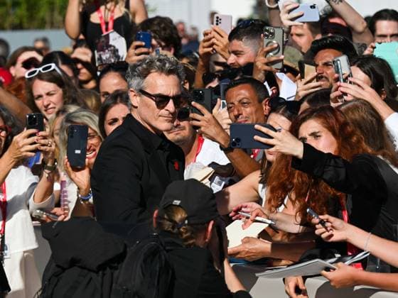 Venice, ITALY: Venice, 82nd Venice International Film Festival 2025 - day 8 - red carpet for the film The Voice of Hind Rajab - Pictured: Rooney Mara, Joaquin Phoenix Venice ITALY  - ZUMAp169 20250903_zea_p169_863 Copyright: xManuelexMangiarottix