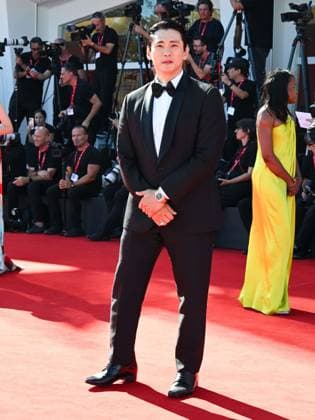 Venice, ITALY: Venice, 82nd Venice International Film Festival 2025 - day 8 - red carpet for the film The Voice of Hind Rajab - Pictured: Teo Yoo Venice ITALY  - ZUMAp169 20250903_zea_p169_867 Copyright: xManuelexMangiarottix