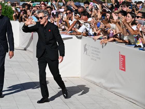 Venice, ITALY: Venice, 82nd Venice International Film Festival 2025 - day 8 - red carpet for the film The Voice of Hind Rajab - Pictured: Rooney Mara, Joaquin Phoenix Venice ITALY  - ZUMAp169 20250903_zea_p169_906 Copyright: xManuelexMangiarottix