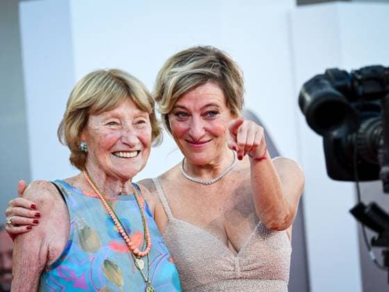 Venice, ITALY: Venice, 82nd Venice International Film Festival 2025 - Evening 8 - Red Carpet for the film Duse - Pictured: Valeria Bruni Tedeschi with her mother Marisa Borini Venice ITALY  - ZUMAp169 20250903_zea_p169_1361 Copyright: xManuelexMangiarottix