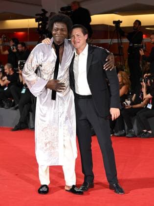 Venice, Italy: Venice, 82nd Venice International Film Festival 2025 - evening 8. Red Carpet of the film In The Hand Of Dante In the photo: Benjamin Clementine, Vito Maria Schnabel Venice Italy  - ZUMAp169 20250903_zea_p169_1739 Copyright: xSimonexComix