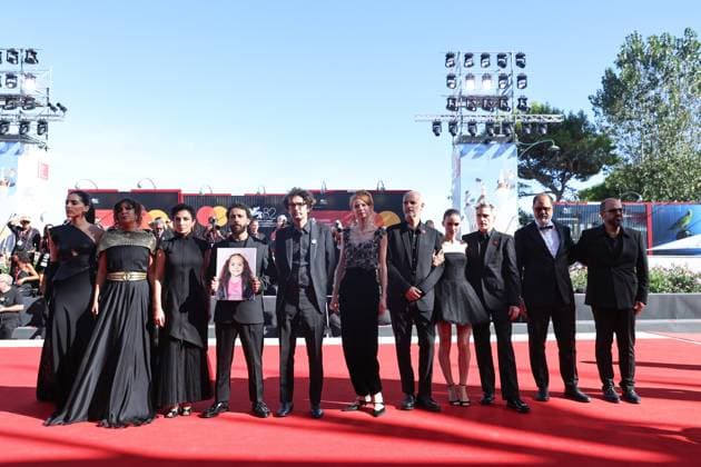 (250904) -- VENICE, Sept. 4, 2025 -- Crew members of the film The Voice of Hind Rajab pose at the red carpet of the premiere during the 82nd Venice Film Festival in Venice, Italy, Sept. 3, 2025. ) ITALY-VENICE-FILM FESTIVAL-THE VOICE OF HIND RAJAB-PREMIERE LixJing 