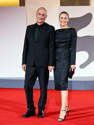 Venice, ITALY: Venice, 82nd Venice International Film Festival 2025 - Evening 9. Red Carpet of the film THE MONSTER In the photo: Stefano Sollima with his partner Alice Sozzi Venice ITALY  - ZUMAp169 20250904_zea_p169_1595 Copyright: xManuelexMangiarottix