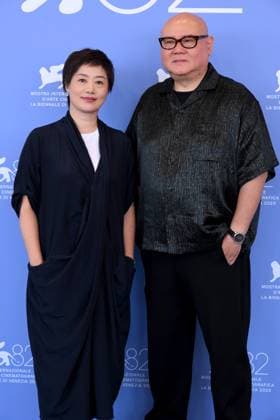 Venice,82nd Venice International Film Festival 2025, - Day 10 - Photocall film : Ri Gua Zhong Tian (The Sun Rises On Us All) Pictured : Cai Shangjun and wife  Copyright: xAlbertoxTerenghi PoolxPhotoxEventsx06x xipa-agency.netx xPoolxPhotoxEventsx06x IPA_Agency_IPA64209367