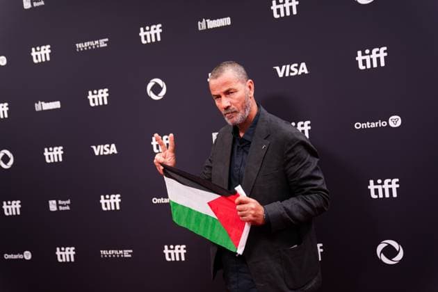 2025 Toronto International Film Festival - Palestine 36 TORONTO, CANADA - SEPTEMBER 5 : Actor Saleh Bakri poses with a Palestinian flag as he attends the premiere of ‘Palestine 36’ during the 2025 Toronto International Film Festival at Roy Thomson Hall in Toronto, Ontario, Canada on September 5, 2025. Mert Alper Dervis Anadolu Ontario Canada. Editorial use only. Please get in touch for any other usage.  Copyright: x2025xAnadoluxMertxAlperxDervisx