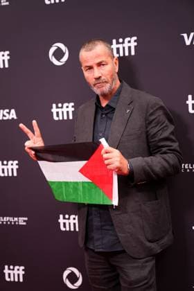 2025 Toronto International Film Festival - Palestine 36 TORONTO, CANADA - SEPTEMBER 5 : Actor Saleh Bakri poses with a Palestinian flag as he attends the premiere of ‘Palestine 36’ during the 2025 Toronto International Film Festival at Roy Thomson Hall in Toronto, Ontario, Canada on September 5, 2025. Mert Alper Dervis Anadolu Ontario Canada. Editorial use only. Please get in touch for any other usage.  Copyright: x2025xAnadoluxMertxAlperxDervisx