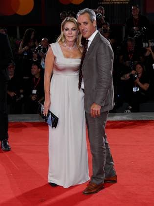 Venice, Italy: Venice, 82nd Venice International Film Festival 2025 - Evening 10 - Red Carpet for the film L Isola di Andrea Pictured: Riccardo Sangiuliano, Claudia Gerini Venice Italy  - ZUMAp169 20250905_zea_p169_1207 Copyright: xAlbertoxTerenghi PoolxxEvenx