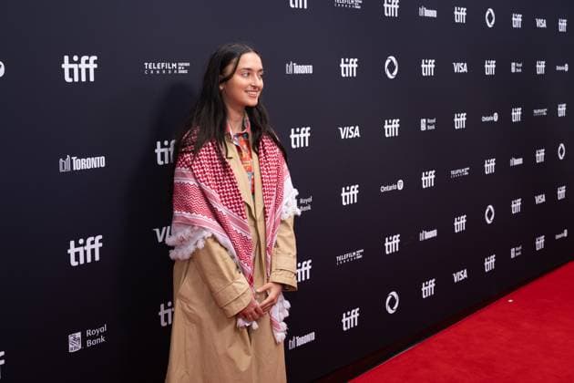 September 5, 2025, Toronto, Ontario, Canada: A guest wearing Palestine keffiyeh attends the red carpet for the Palestine 36 premiere during the 2025 Toronto International Film Festival at Roy Thomson Hall. on September 5, 2025 in Toronto, Canada. Toronto Canada - ZUMAe321 20250905_zea_e321_017 Copyright: xLeonardoxRamirezx