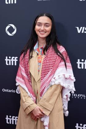 September 5, 2025, Toronto, Ontario, Canada: A guest wearing Palestine keffiyeh attends the red carpet for the Palestine 36 premiere during the 2025 Toronto International Film Festival at Roy Thomson Hall. on September 5, 2025 in Toronto, Canada. Toronto Canada - ZUMAe321 20250905_zea_e321_085 Copyright: xLeonardoxRamirezx