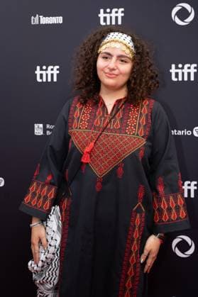 September 5, 2025, Toronto, Ontario, Canada: A guest wearing Palestine dress attends the red carpet for the Palestine 36 premiere during the 2025 Toronto International Film Festival at Roy Thomson Hall. on September 5, 2025 in Toronto, Canada. Toronto Canada - ZUMAe321 20250905_zea_e321_009 Copyright: xLeonardoxRamirezx