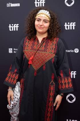 September 5, 2025, Toronto, Ontario, Canada: A guest wearing Palestine dress attends the red carpet for the Palestine 36 premiere during the 2025 Toronto International Film Festival at Roy Thomson Hall. on September 5, 2025 in Toronto, Canada. Toronto Canada - ZUMAe321 20250905_zea_e321_065 Copyright: xLeonardoxRamirezx