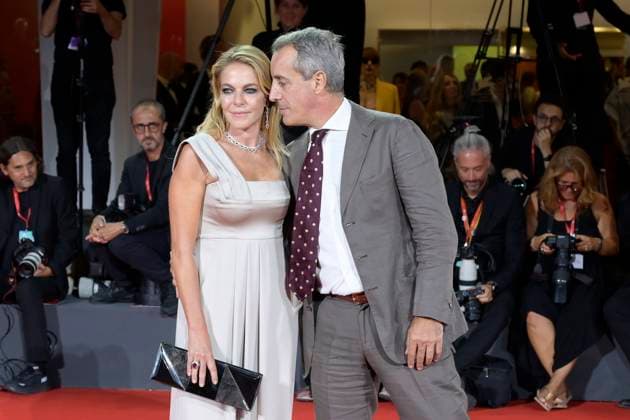 Silent friend red carpet in Venice Lido, Italy - 05 Sep 2025 Claudia Gerini (l) and Riccardo Sangiuliano (r) attend the Silent friend red carpet during the 82nd Venice Film Festival at Palazzo del Cinema. Venice Lido Italy Copyright: xMarioxCartellix xSOPAxImagesx _DSC7586