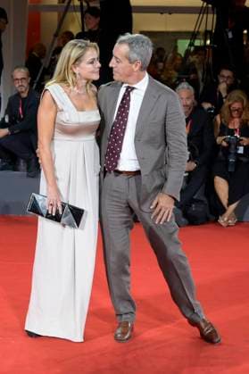 Silent friend red carpet in Venice Lido, Italy - 05 Sep 2025 Claudia Gerini (l) and Riccardo Sangiuliano (r) attend the Silent friend red carpet during the 82nd Venice Film Festival at Palazzo del Cinema. Venice Lido Italy Copyright: xMarioxCartellix xSOPAxImagesx _DSC7590