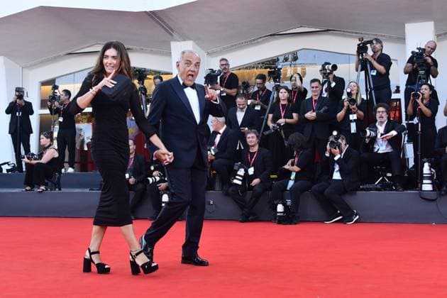 82eme Festival International du Film de Venise Mostra de Venise CLOSING CEREMONY and CHIEN 51 Premiere Red Carpet at the 82nd International Venice Film festival Giulia Rosmarini and Director of the Venice Film Festival Alberto Barbera attend the 2025 Closing Ceremony red carpet 448401 2025 09 06 Venice Italy  Copyright: xThomasxBohlenx STAR_448401_002