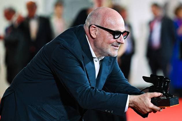 Venice Winners Red Carpet AM Gianfranco Rosi poses with the Special Jury Prize for Below the Clouds attending the Winners Red Carpet of the 82nd Venice International Film Festival at the Lido in Venice, Italy on September 06, 2025. Photo by Aurore Marechal ABACAPRESS.COM Venice Italy  Copyright: xMarechalxAurore ABACAx