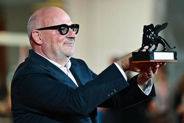 Venice Winners Red Carpet AM Gianfranco Rosi poses with the Special Jury Prize for Below the Clouds attending the Winners Red Carpet of the 82nd Venice International Film Festival at the Lido in Venice, Italy on September 06, 2025. Photo by Aurore Marechal ABACAPRESS.COM Venice Italy  Copyright: xMarechalxAurore ABACAx